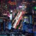 A breathtaking aerial view of Taipei at night showcasing bustling streets and illuminated skyscrapers.
